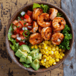 Fully assembled Taco Shrimp Bowl with colorful toppings