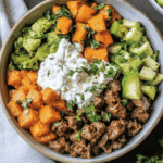 Cottage Cheese Sweet Potato Bowl served with avocado and hot honey