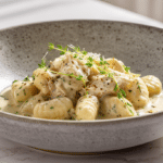 Creamy Crack Chicken Gnocchi in a white bowl