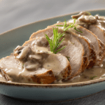 Slow Cooker Pork Loin with rich Mushroom Sauce on a platter.