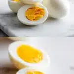 Two perfectly halved hard boiled eggs resting on a white marble surface, revealing firm, bright white exteriors and creamy, golden-yellow yolks. The eggs are styled simply, showcasing the ideal texture and color of perfect hard boiled eggs.